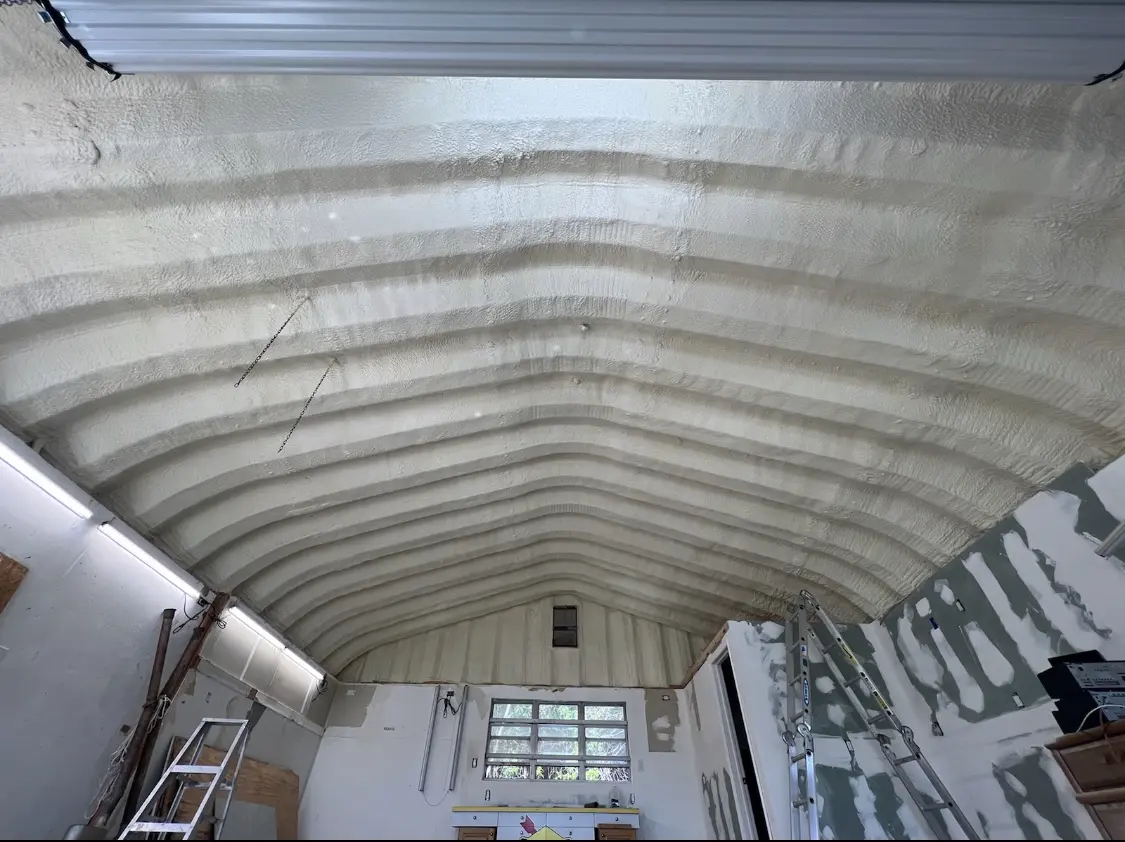 Spray polyurethane foam applied to the underside of a metal roof deck in Walnut Creek